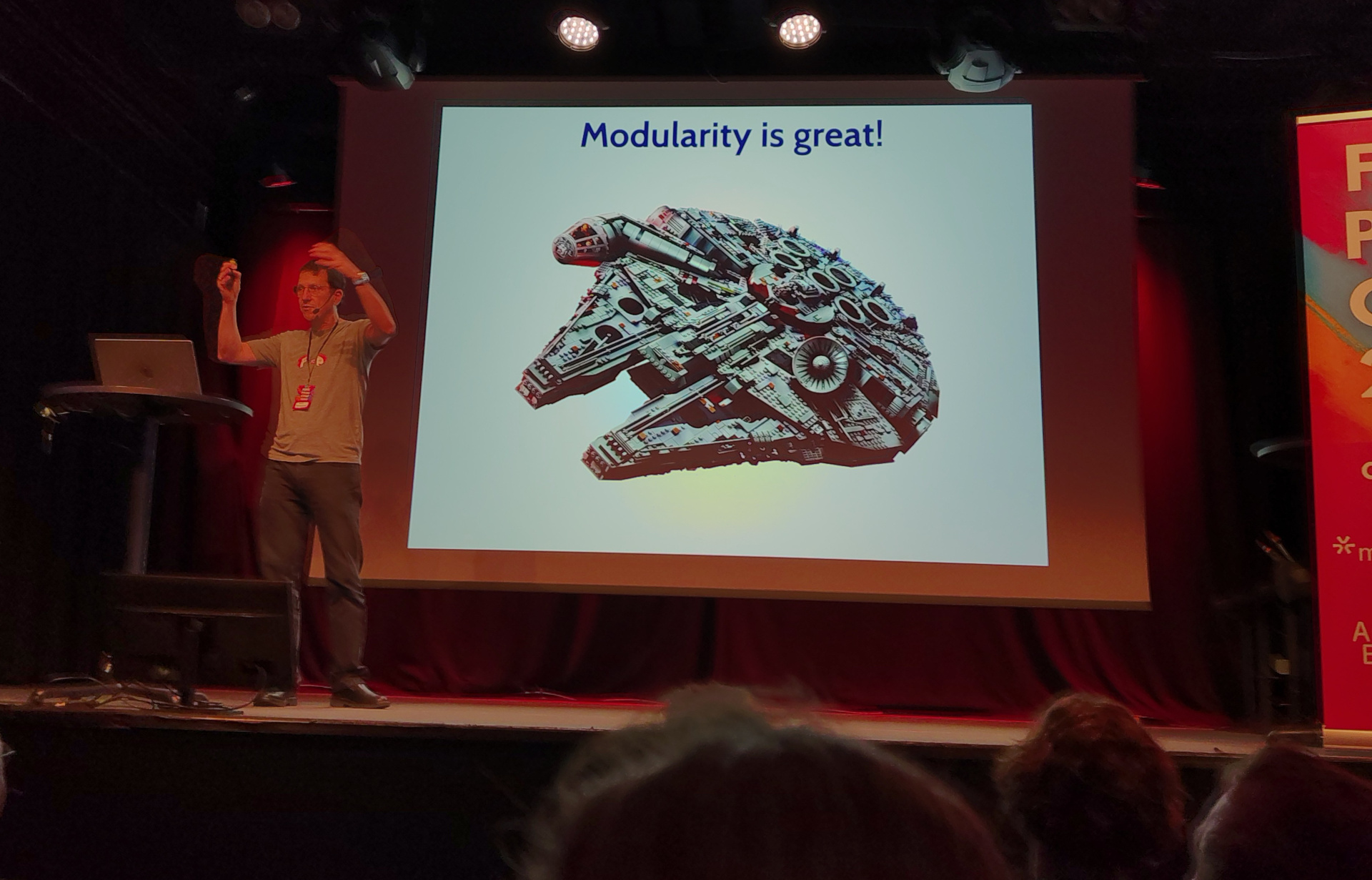 An uncontroversial statement Eric presents a slide labelled "Modularity is great!"