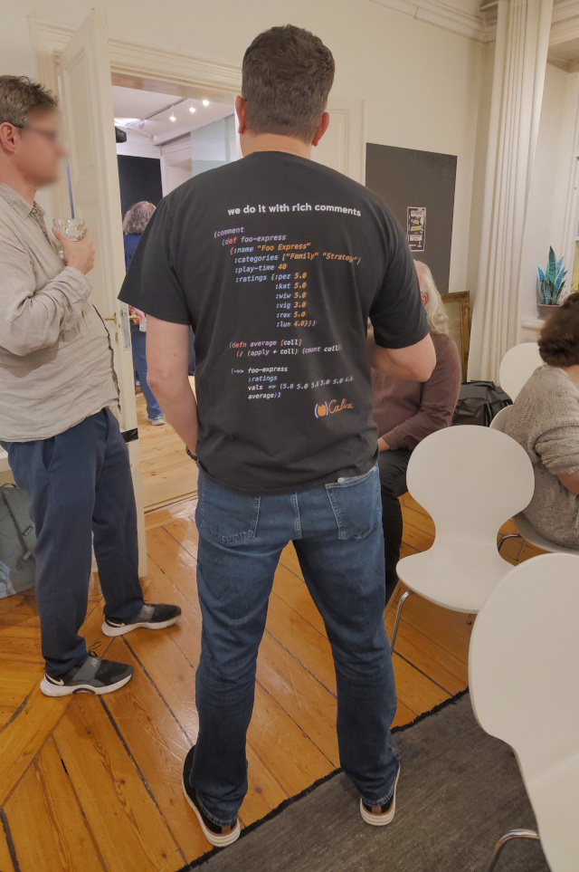 Unlike the rich man, the Rich comment shall surely pass through the gates of heaven with ease. A man wearing a shirt that says "we do it with rich comments"