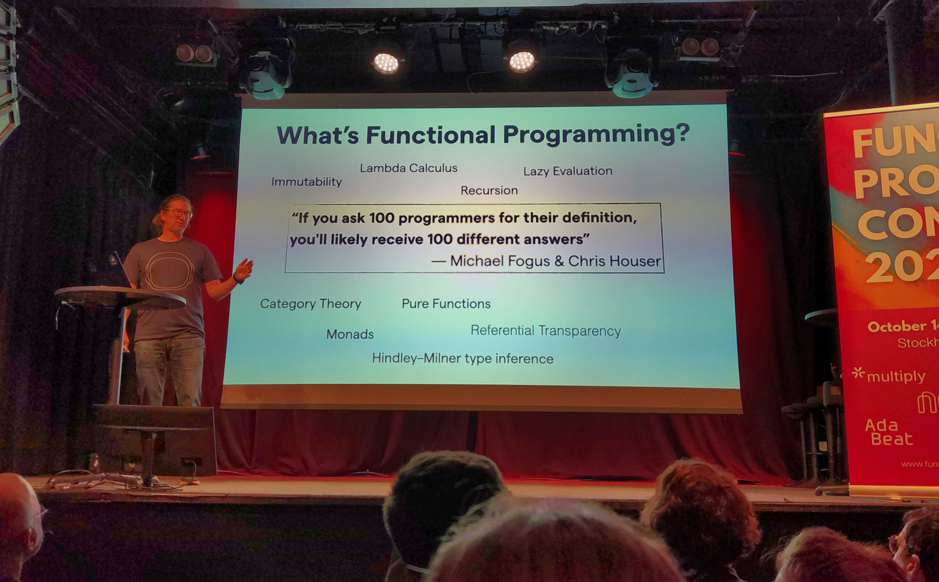 What indeed? Adam presents a slide labelled "What's Functional Programming"